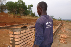 Builder constructing school