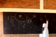 Teacher at blackboard